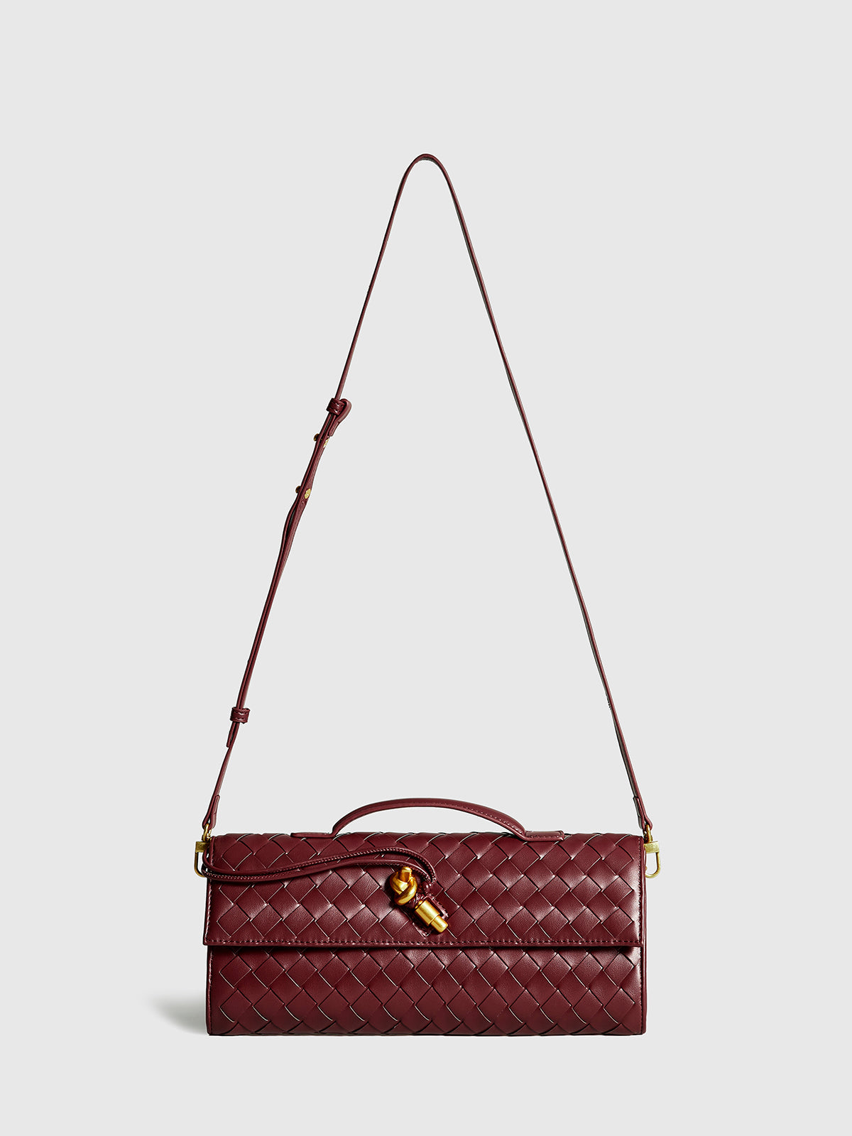 Luxe Twist Lock Woven Clutch