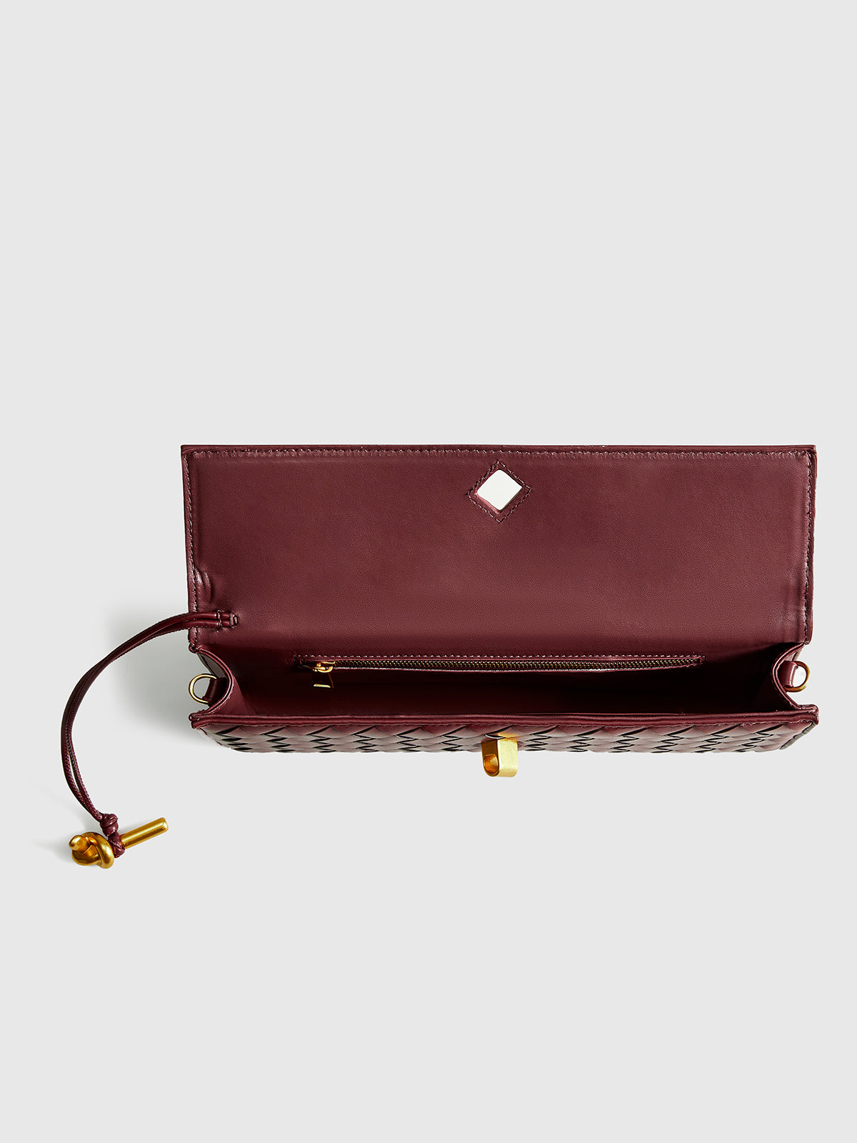 Luxe Twist Lock Woven Clutch
